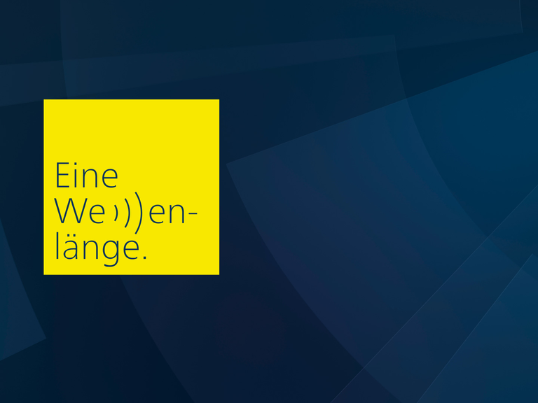 Text: Eine Wellenlänge