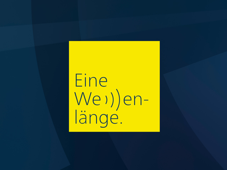 Text: Eine Wellenlänge